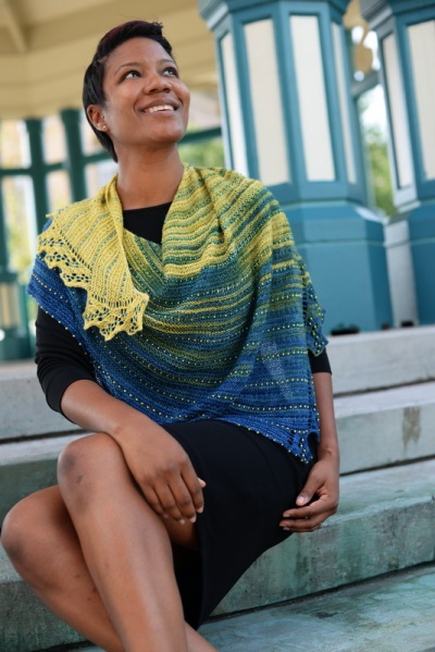 BitterBlue- a textured lace shawl knit in gradient yarn with gradient beads, by Barbara Benson.