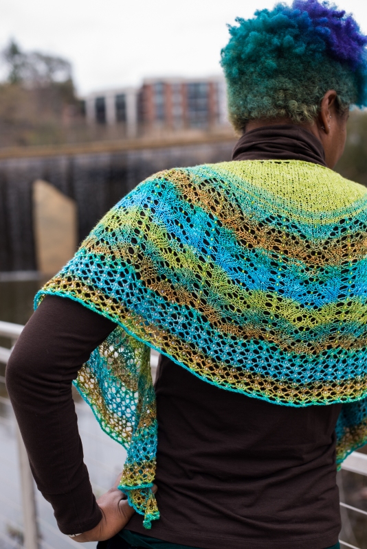 Each to Each by Barbara Benson: a beaded, crescent shaped shawl knit in a gradient yarn.